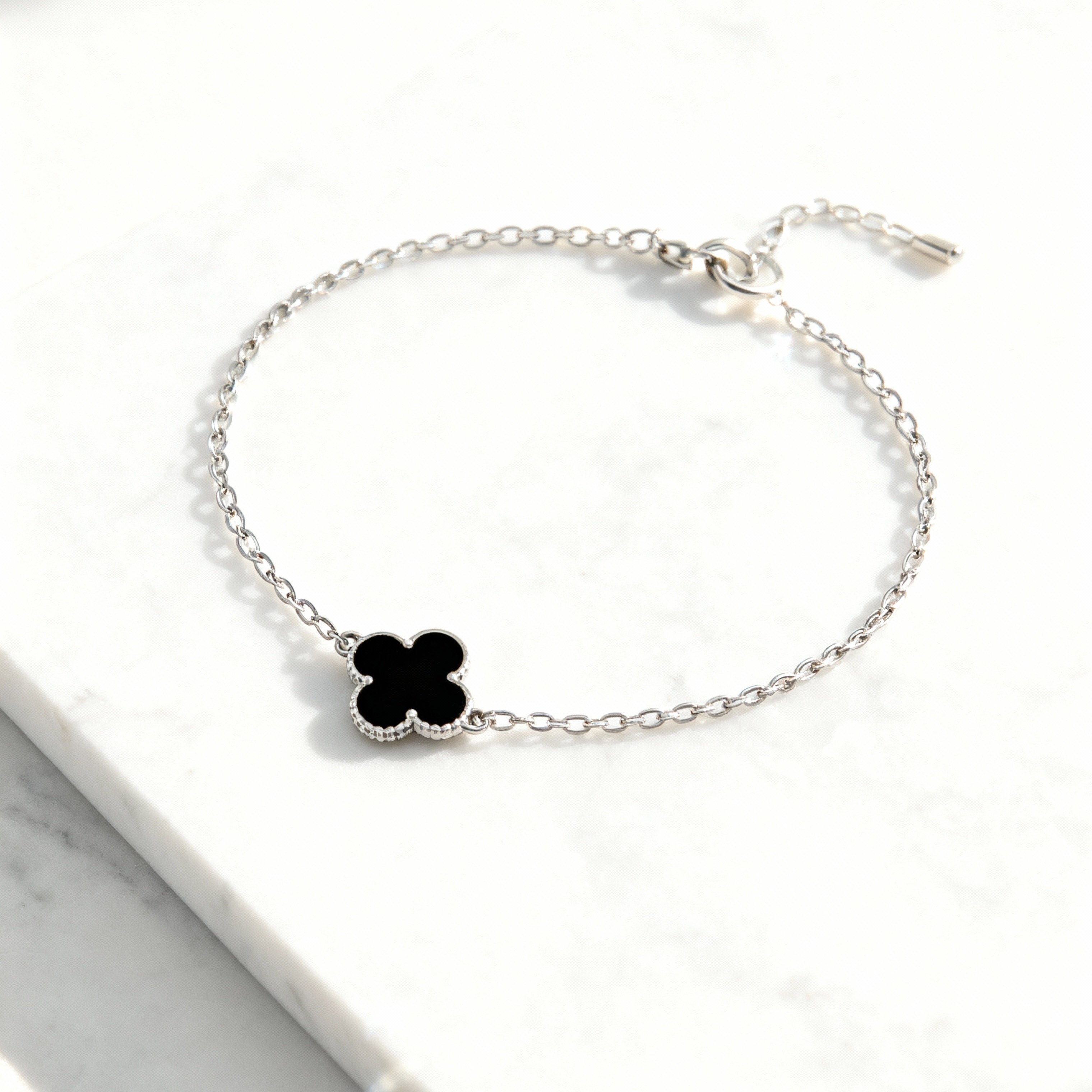 Four-leaf clover charm bracelet